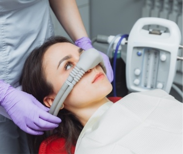 Female patient with nasal mask for nitrous oxide sedation